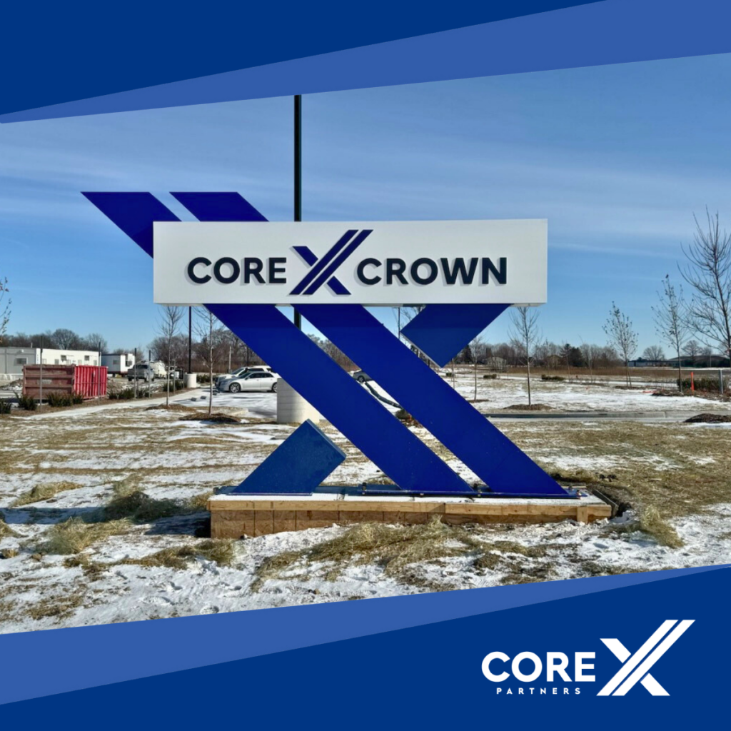 CORE X CROWN in the snow with blue sky in background and white CORE X logo